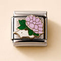 A silver-toned Italian charm link featuring an enamel design of a small white hedgehog and a large light purple hydrangea flower with green leaves, set against a warm beige background.