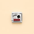 A silver-toned rectangular charm link featuring an enamel design of four playing cards (hearts, diamonds, clubs, spades) with 'POKER' written on a red banner, set against a solid pale peach background.