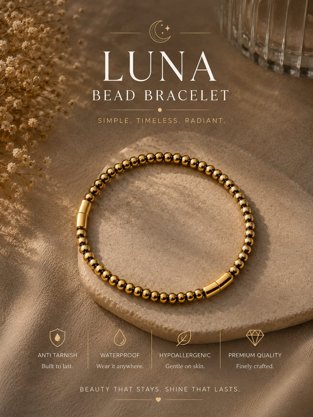 A gold beaded bracelet labeled 'LUNA BEAD BRACELET' is displayed on a beige stone slab with decorative dried flowers and a glass in a warm, styled setting. Text at the top and bottom describes product features.