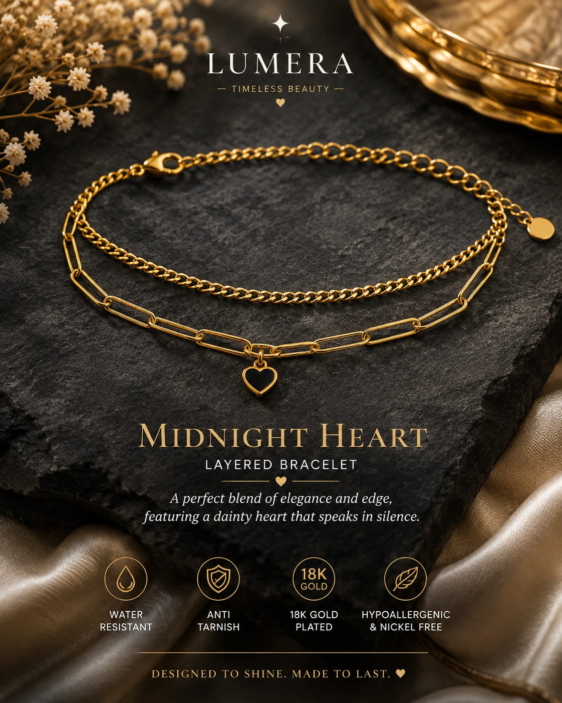 A gold layered bracelet with a small heart charm, displayed on a dark slate surface with decorative dried flowers and satin fabric. The brand name 'LUMERA' is visible at the top, and product details for the 'Midnight Heart Layered Bracelet' are shown below.