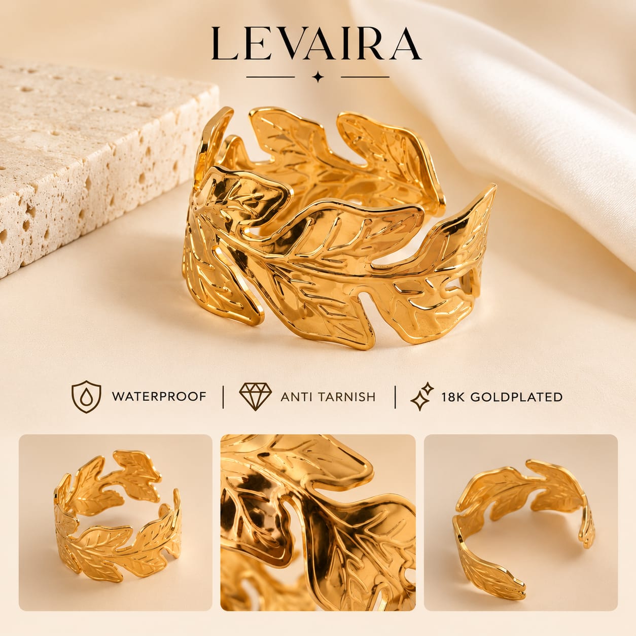 Levaira gold-plated leaf-shaped cuff ring shown on a warm beige background with a stone slab and draped fabric. The image includes feature icons for waterproof, anti tarnish, and 18K goldplated, plus three inset close-up views of the ring.